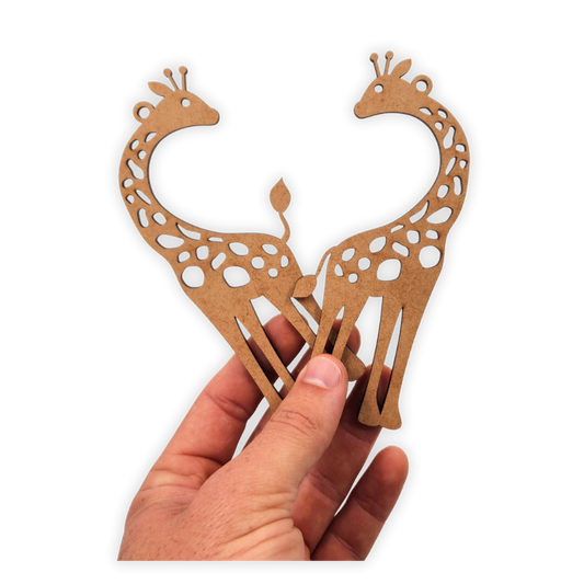 A pair of wooden giraffes for painting