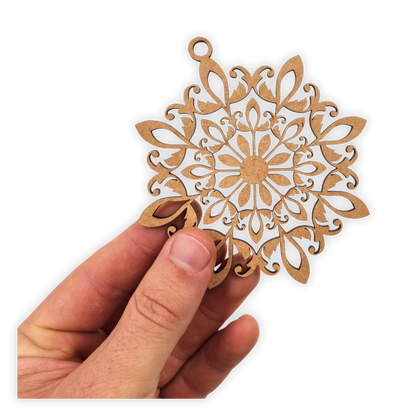 Decorative hanging mandala wooden blank cut out of 3mm MDF held in hand