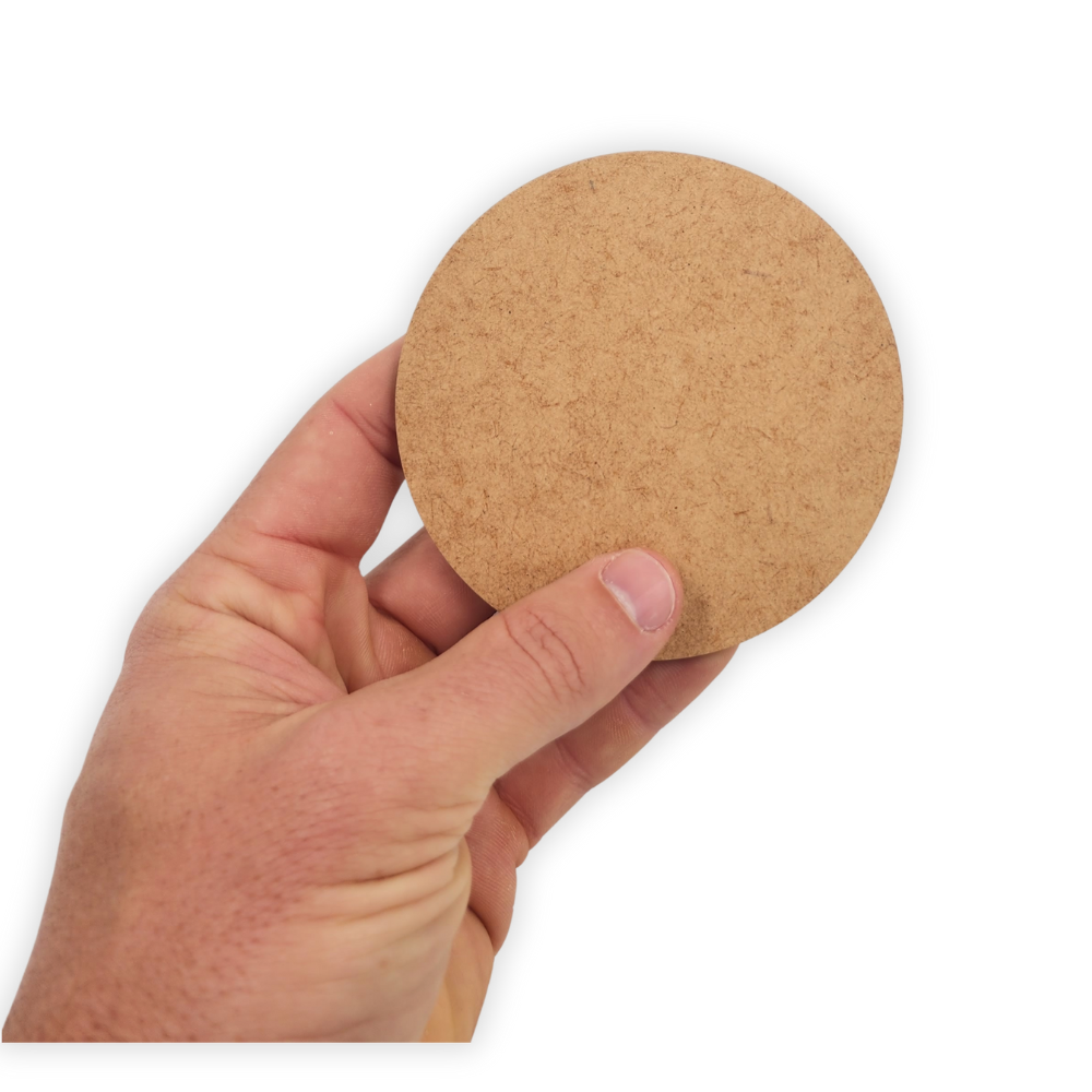 Round wooden blank coaster cutout by the wood lab